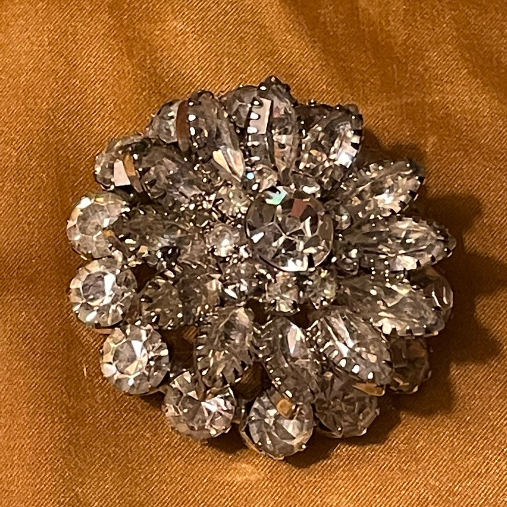 Vintage large 3d silver colored pin with clear rhinestones floral pattern